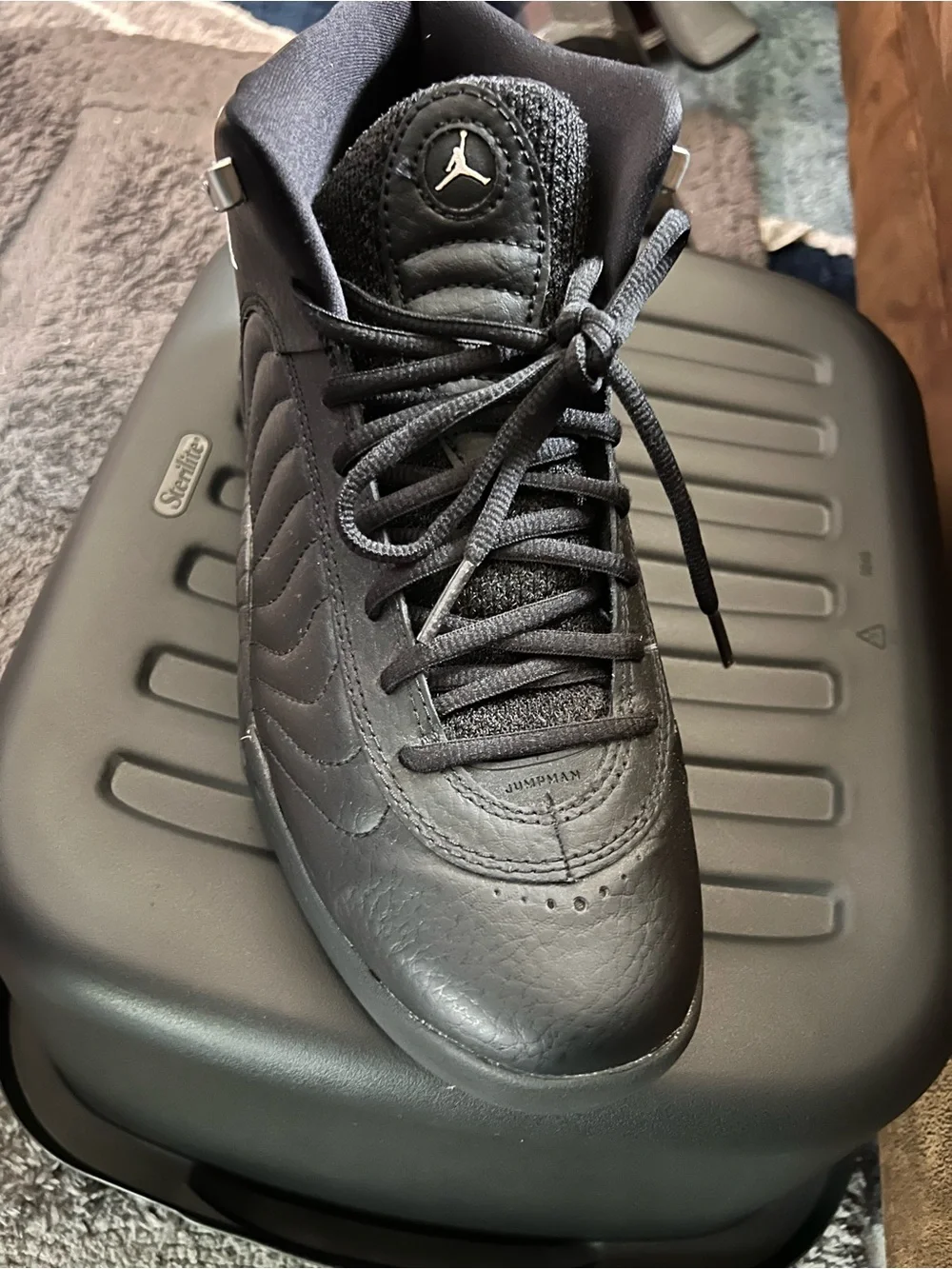 Jordan Men’s Black Leather High-Top Sneakers with Silver Jumpman
